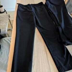 7 Pairs of Men's Black pants/slacks